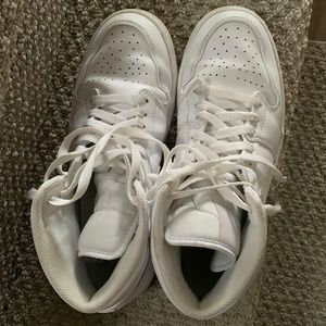 Rarely worn Air Force high top all white Jordan’s. Men’s size 8.5.